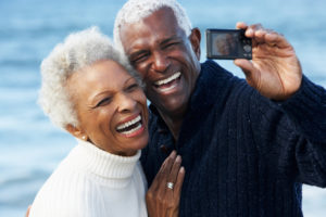 Older Black Couple taking a selfie