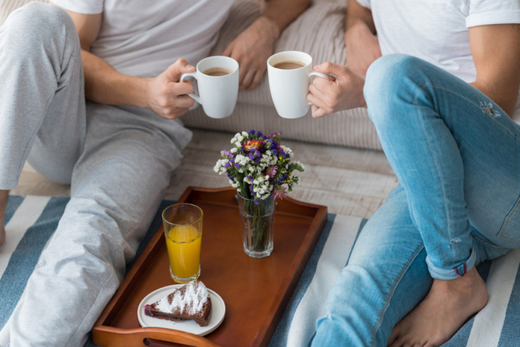 Gay couple having breakfast